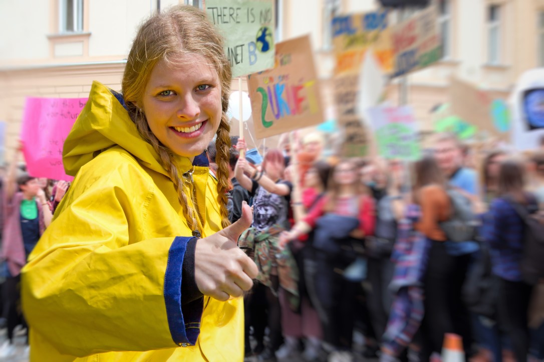 Young woman demonstrating against Climate Change