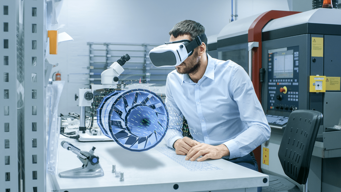 Factory Chief Engineer Wearing VR Headset Designs Engine Turbine on the Holographic Projection Table. Futuristic Design of Virtual Mixed Reality Application